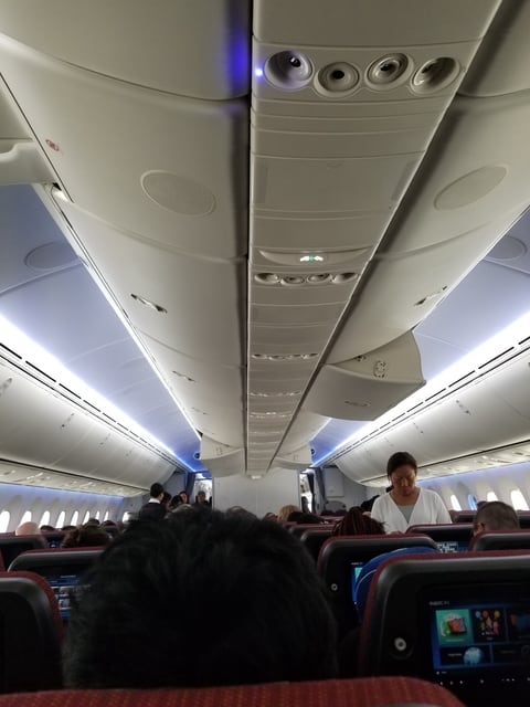 Image of the interior of the plane going towards Japan